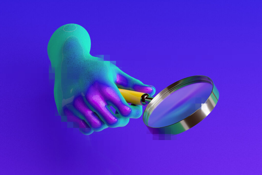 hand with magnifying glass
