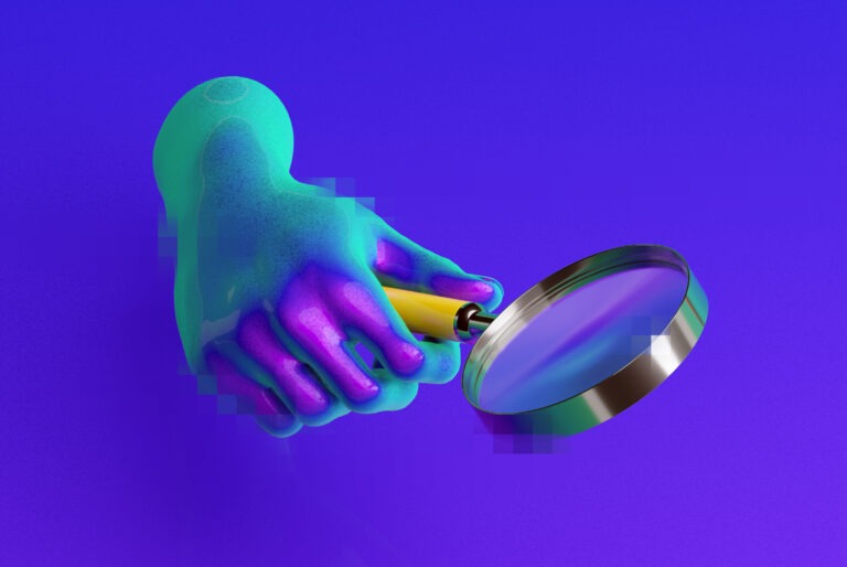 hand with magnifying glass